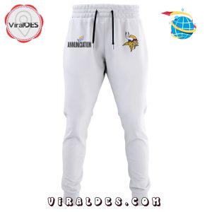 White Annunciation joggers with Vikings logo and text on the thighs.