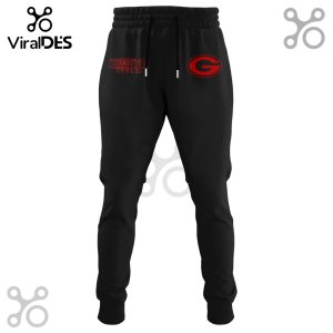 Black sweatpants with Stranger Things and Packers logos in red.