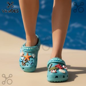 Ocean Premium Crocs Clogs with Charms. Stylish blue Crocs with ocean-themed Jibbitz. Comfortable and customizable footwear.