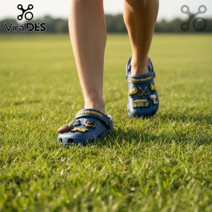 Michigan Wolverines Crocs with team-themed Jibbitz charms.