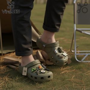 Camping Crocs clogs with fun camping-themed charms. Comfortable and durable footwear for outdoor adventures. Premium quality.