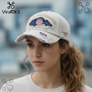 Distressed cap with 'Olympic Gold Champions USA Hockey 2026' design and USA flag shield!