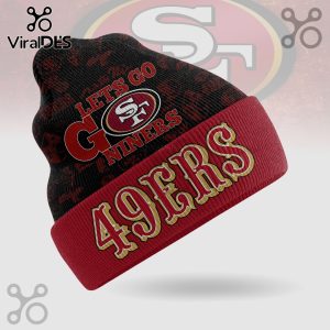 A beanie with a red brim, featuring the text '49ERS' and 'LETS GO NINERS' with the 49ers logo on the upper section.!