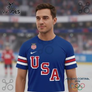 Blue USA hockey shirt for the 2026 Winter Olympics in Milano Cortina with red and white accents.!
