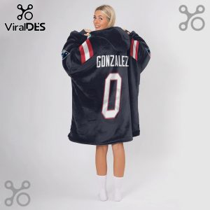 Person wearing a hoodie blanket with 'GONZALEZ' and the number '0' on the back, styled like a football jersey.!