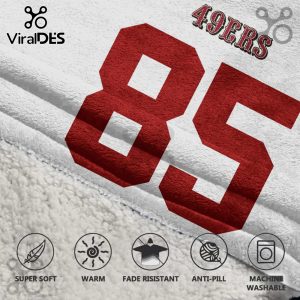 A 49ers blanket with the number 85 in red and team name.!