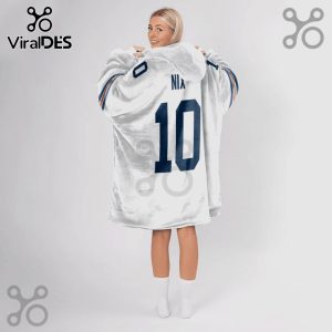 Person wearing a white hooded blanket with the name 'Nix' and the number 10 on the back in blue lettering.!