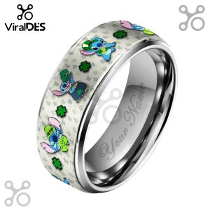 Ring featuring Stitch in St. Patrick's Day themed outfits and shamrocks on a metal band.!