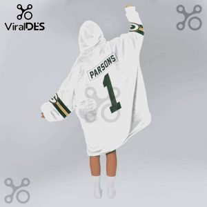 Person wearing a white hooded blanket with 'PARSONS' and the number '1' printed on the back, with green and gold accents.!