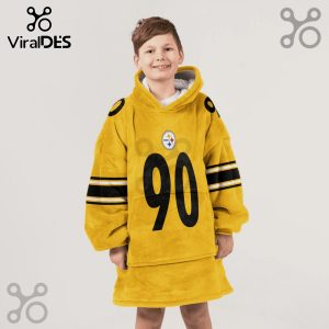 A kid wearing a yellow oversized hoodie with the Steelers logo and the number 90 on it.!