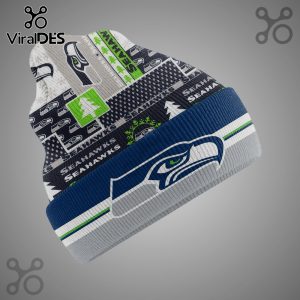 Seattle Seahawks beanie featuring team logos, colors, and winter-themed pattern.!