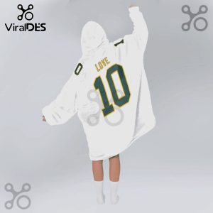 Person wearing white oversized hooded blanket with 