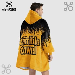 Person wearing a black and yellow oversized hoodie with 'The Terrible Towel' text on the back.!