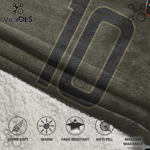 Close-up of a super soft, warm, fade-resistant, anti-pill, machine washable blanket with a large number 10 design.!