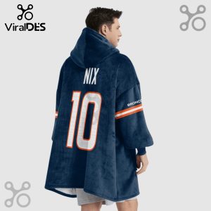 Person wearing a navy blue hoodie blanket with 'NIX' and the number '10' on the back, plus 'BRONCO' on the sleeve.!