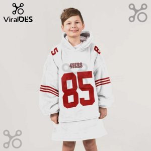A young boy wears an oversized wearable blanket hoodie featuring the 49ers logo and the number 85 in red.!