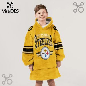 Boy wearing a large, yellow, hooded blanket with Pittsburgh Steelers logo and stripes on the sleeves.!