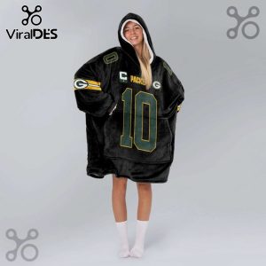 A woman wears a black oversized hoodie with Green Bay Packers #10 football jersey design.!
