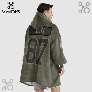 Hooded blanket featuring 'KELCE' and the number '87' in black with gold trim on the back, along with an American flag.!