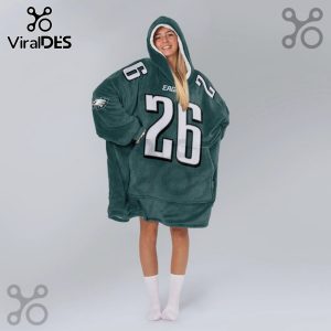 Person wearing oversized hooded blanket with Philadelphia Eagles colors and number 26 on front and back.!