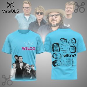 Light blue Wilco band t-shirt with pink logo, band photo front! Cartoon band faces, 'AN EVENING WITH WILCO!!', 2026 tour dates back!