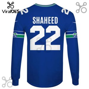 Blue long-sleeve jersey with the name SHAHEED and number 22 in white, plus a Seahawks logo on the sleeve.!