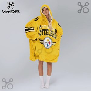 Person wearing a yellow oversized hoodie with Pittsburgh Steelers logo and text on it.!