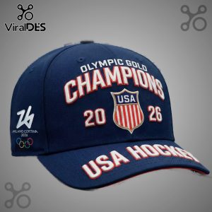 Navy blue baseball cap with 'Olympic Gold Champions', 'USA Hockey' text, USA shield, and Milano Cortina 2026 logo.!