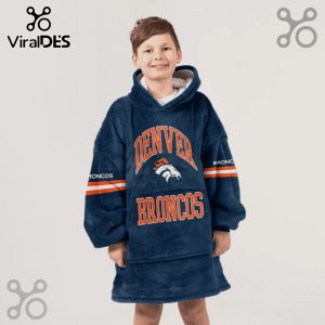 Child wearing a Denver Broncos hooded blanket featuring the team logo and colors.!