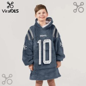 A kid wearing a Patriots themed oversized hoodie blanket with the number 10 in front.!