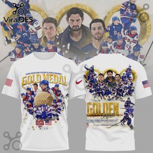 White t-shirt with 2026 USA Olympic Men's Ice Hockey Team design featuring players and 'Gold Medal' text.!