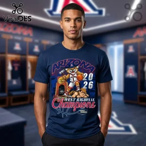 Navy tee: Arizona 2026 West Regional Champions! Cartoon bobcat, NCAA trophy, 'March Madness' text, red font, blue design.!