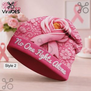 Pink beanie with rose, ribbon, and floral pattern. Text: No One Fights Alone! Breast cancer awareness support design!