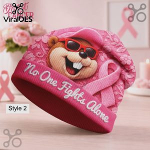 Pink beanie with cartoon beaver art and text: No One Fights Alone! Breast Cancer Awareness style!