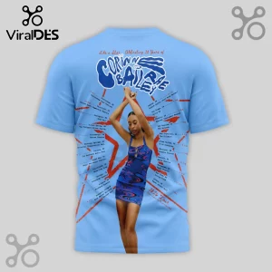 Blue tee shows tour dates, 'Like a Star Celebrating 20 Years of Corinne Bailey Rae' graphic, and the artist in a blue dress!