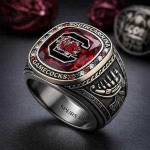 Silver tone ornate ring, large red faceted gem, black C logo, red Gamecock. SOUTH CAROLINA GAMECOCKS, SPURS UP text!