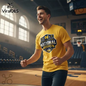 Yellow M 26 NCAA Men's Basketball National Champions collegiate t-shirt with blue and yellow shield design on a man!