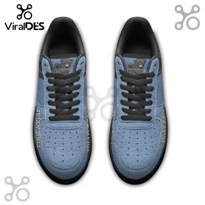 Blue denim sneakers with black soles, a Highland cow on the tongue, and yellow 'JELLY ROLL' text on the side!