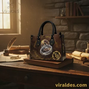 Brown fantasy handbag, black handles, gold and silver rings design, mystical script, 'TB' monogram, 'RAYS' text!