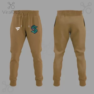 Tan casual sweatpants featuring white stylized F logo and teal, pink, green floral S graphic on front thigh!