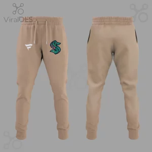 Tan athletic joggers with white F logo and large floral S logo featuring teal leaves, pink flowers, black outlines!