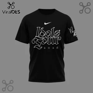 Black concert t-shirt with white gothic font text 