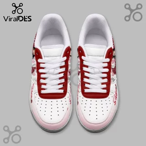 Custom white sneakers with red and pink details featuring a cartoon girl in a red polka dot dress and Salena script text!