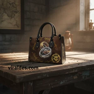 Brown fantasy tote bag features gold and silver inscribed rings, golden script, 'TWINS' text, and a stylized symbol!
