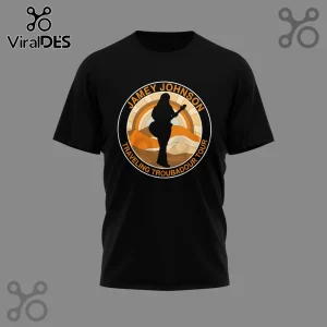 Black t-shirt with a retro orange circle graphic of a guitarist silhouette and text Jamey Johnson Traveling Troubadour Tour.!