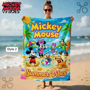Mickey Mouse beach towel with Minnie, Donald, and Goofy. Bright colors with text 'Mickey Mouse Summer Vibes'!
