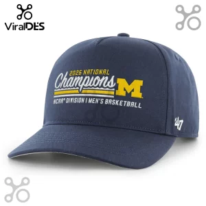Dark blue baseball cap with collegiate sports graphic! Features '2026 NATIONAL Champions M NCAA® DIVISION I MEN'S BASKETBALL 47' in yellow and white!