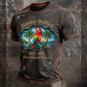 Vintage gray distressed t-shirt with tropical parrot graphic reading Jimmy Buffett EST 1973 Parrothead Forever in gold text!