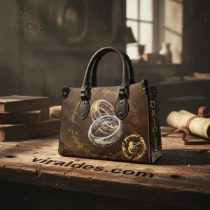 Brown tote bag with black handles! Fantasy style gold and silver rings, ancient script, and ORIOLES text on side!