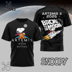 Black Snoopy astronaut T-shirt with 'Artemis To the Moon and Beyond' and 'Back to the Moon Artemis II 2026' text!